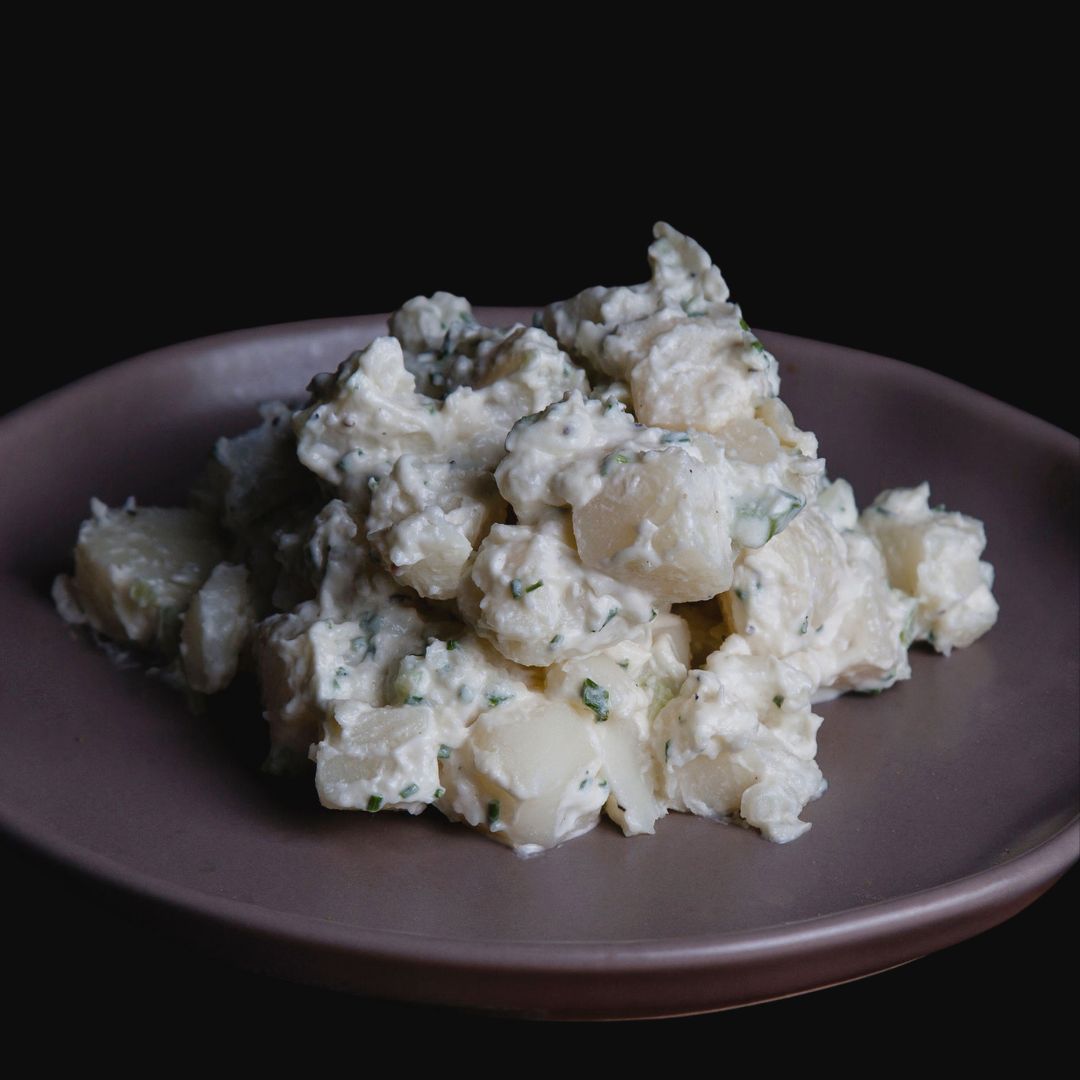 Ensalada de papa - Schmaltzy Bros Delicatessen